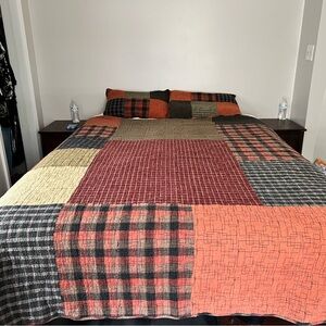 Patchwork Quilt in Red, Black, and Tan